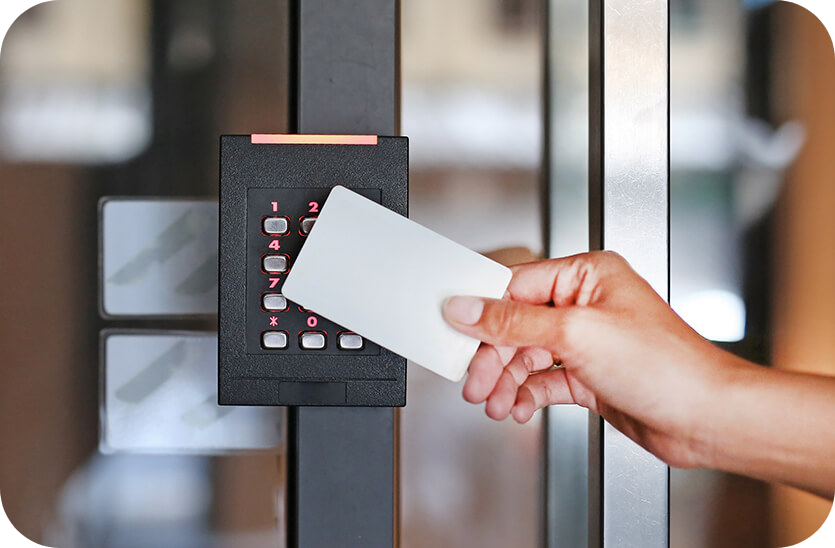 person accessing a door using a security card
